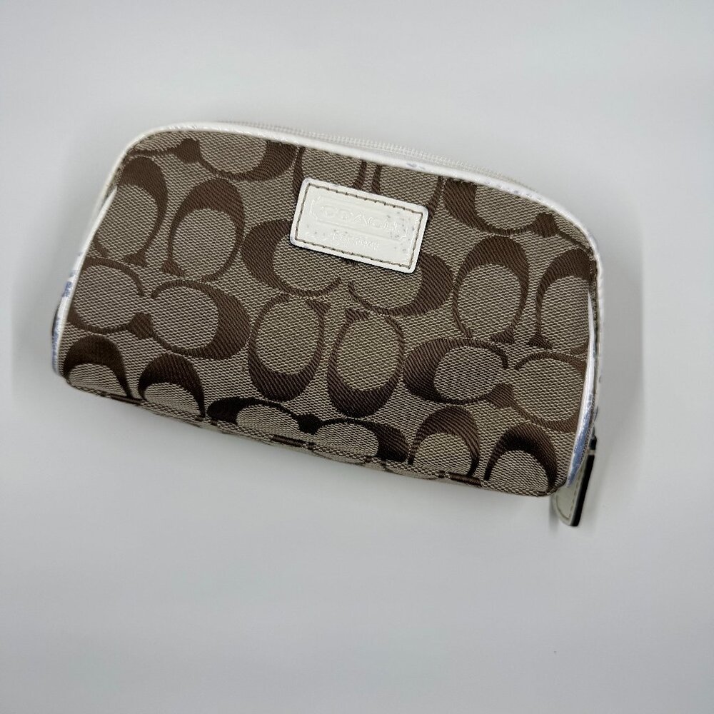 Coach cosmetic bag. 7" W x 4" W
